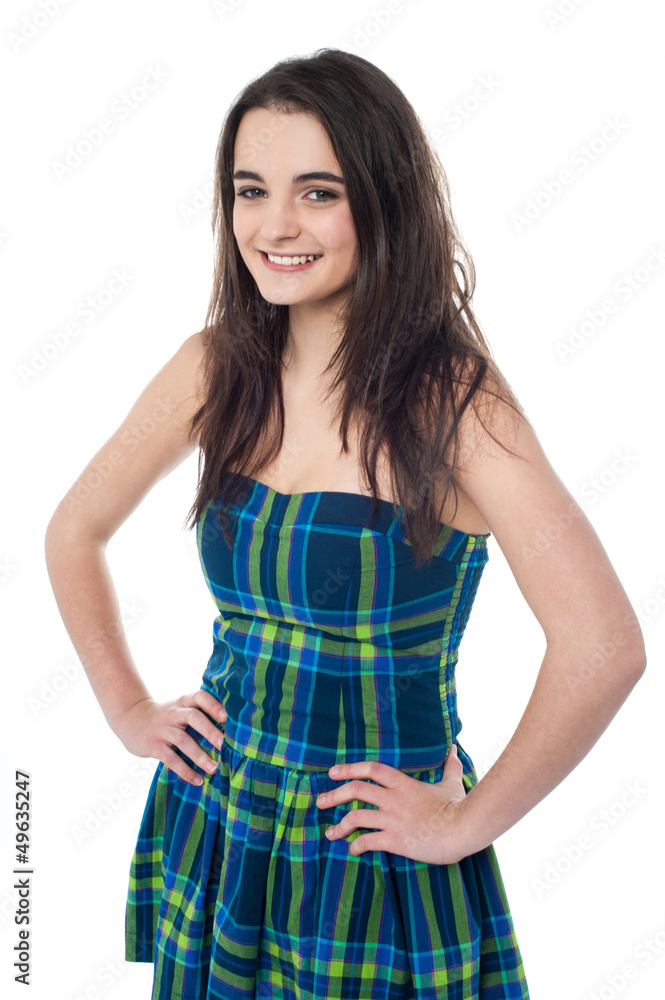 Attractive young girl with hands on waist Attractive young girl with hands on waist
