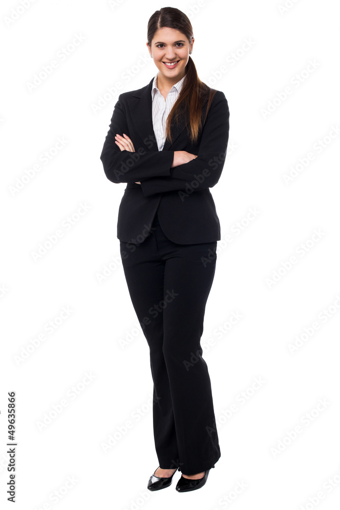 Smiling business executive with arms crossed Smiling business executive with arms crossed
