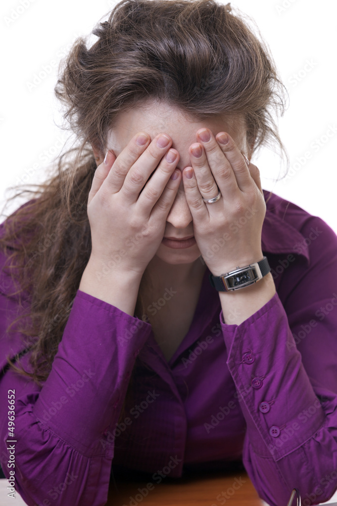 Young businesswoman with a headache isolated on white Young businesswoman with a headache isolated on white