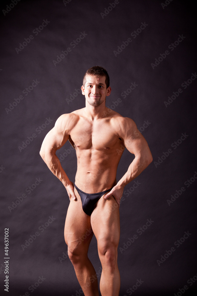 young bodybuilder posing young bodybuilder posing