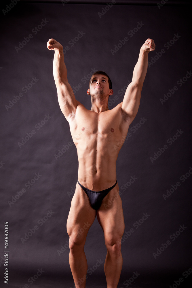 young bodybuilder posing young bodybuilder posing