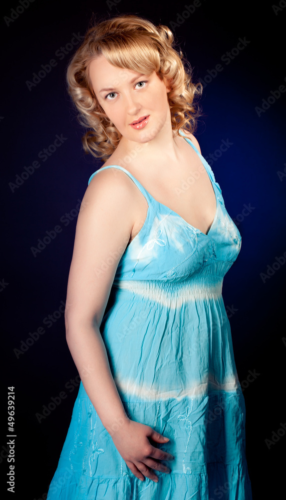 Portrait of a beautiful female model on dark background Portrait of a beautiful female model on dark background