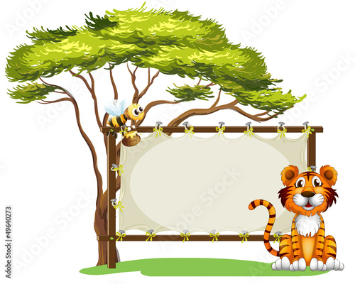 A blank signage with a tiger and a bee