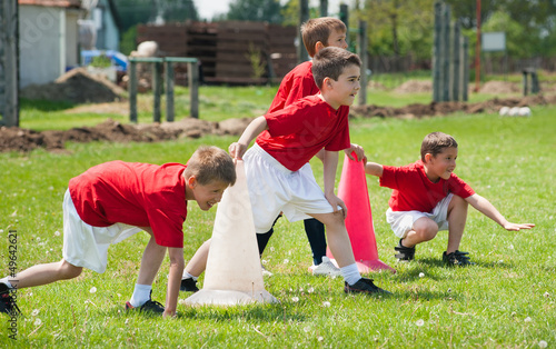 kids have football training outside photo