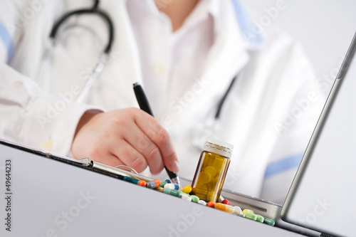 Doctor writing a prescription