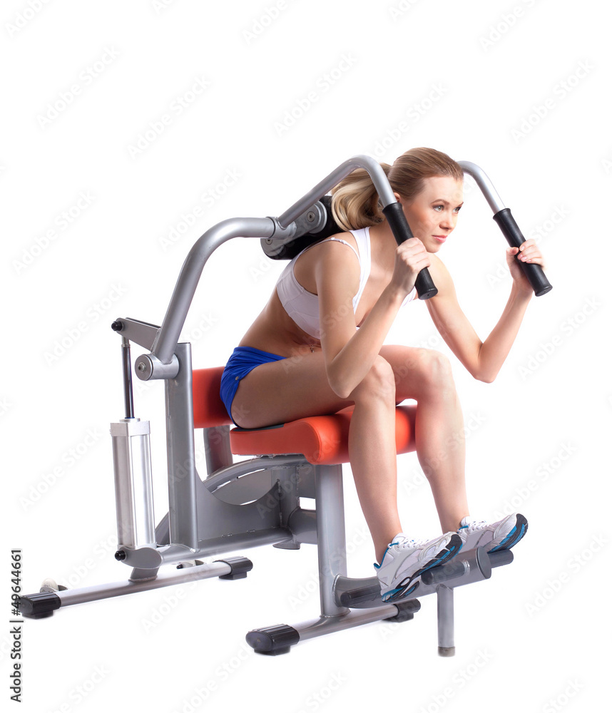 Blonde woman on isodynamic exerciser Blonde woman on isodynamic exerciser