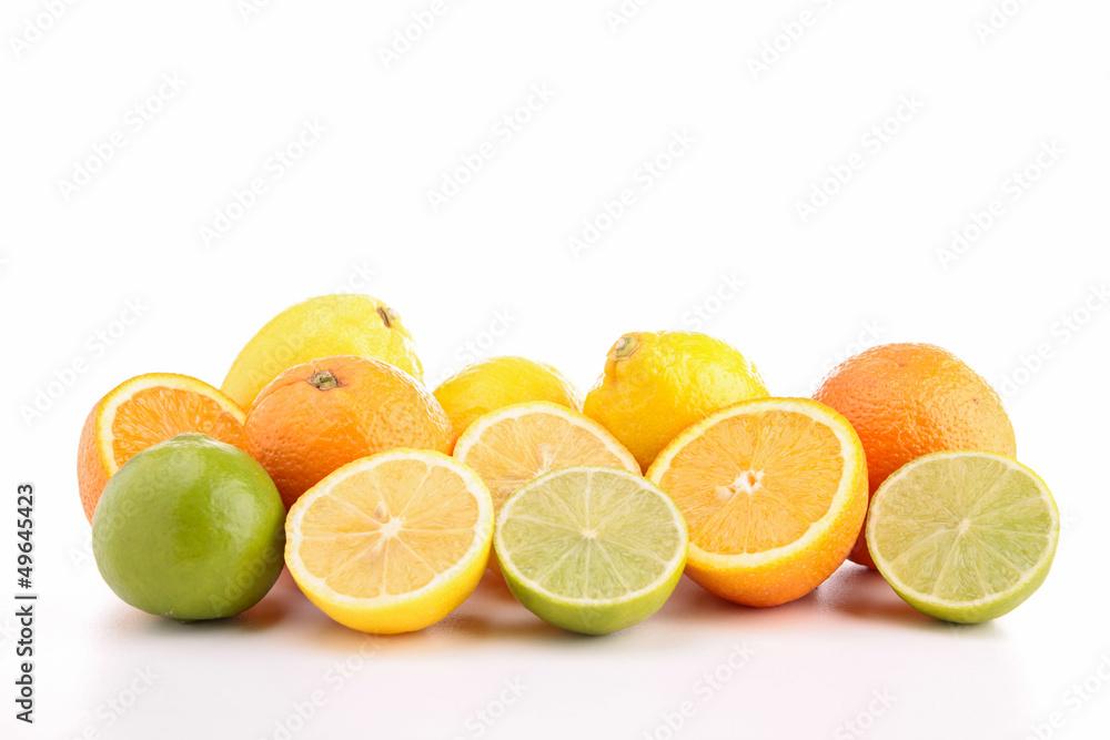 heap of orange, green and yellow lemon heap of orange, green and yellow lemon