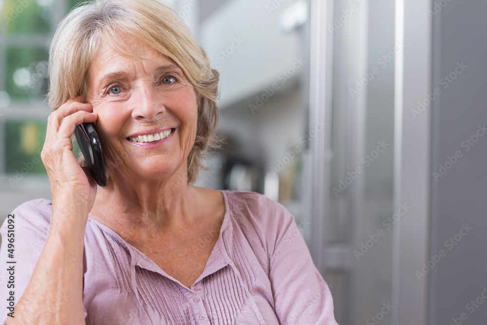 Happy mature woman calling Happy mature woman calling