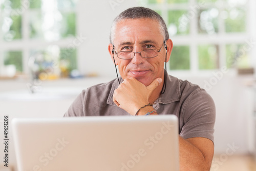 Happy man with laptop