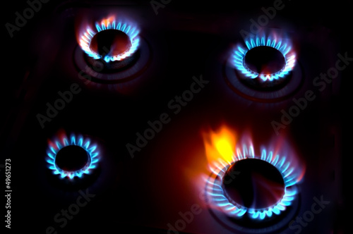 blue flames of a burning natural gas