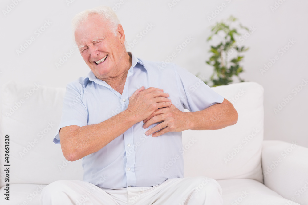Old man suffering with heart pain Old man suffering with heart pain