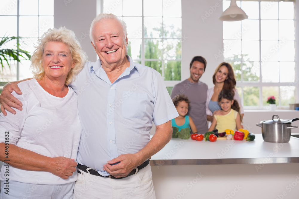 Grandparents in front of their family Grandparents in front of their family