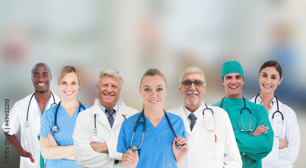 Smiling medical team standing in line Smiling medical team standing in line