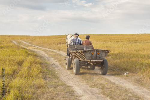 Two man on old cart - Ukraine.