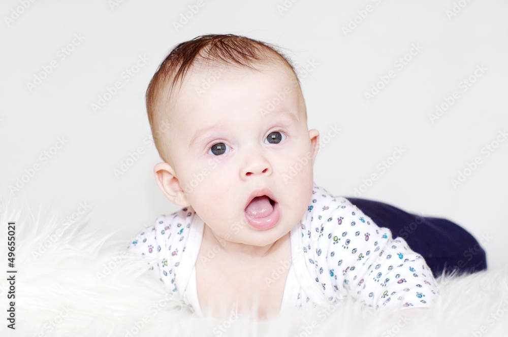 Portrait of the five-months surprised baby Portrait of the five-months surprised baby