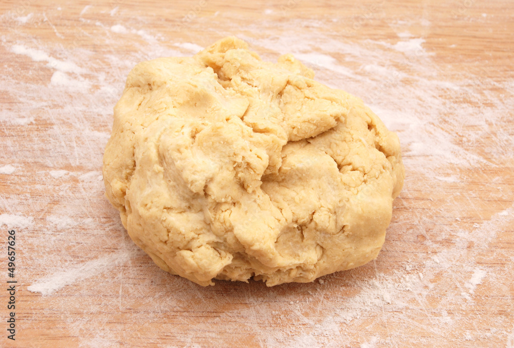 Fresh ball of pastry ready to be rolled out Fresh ball of pastry ready to be rolled out
