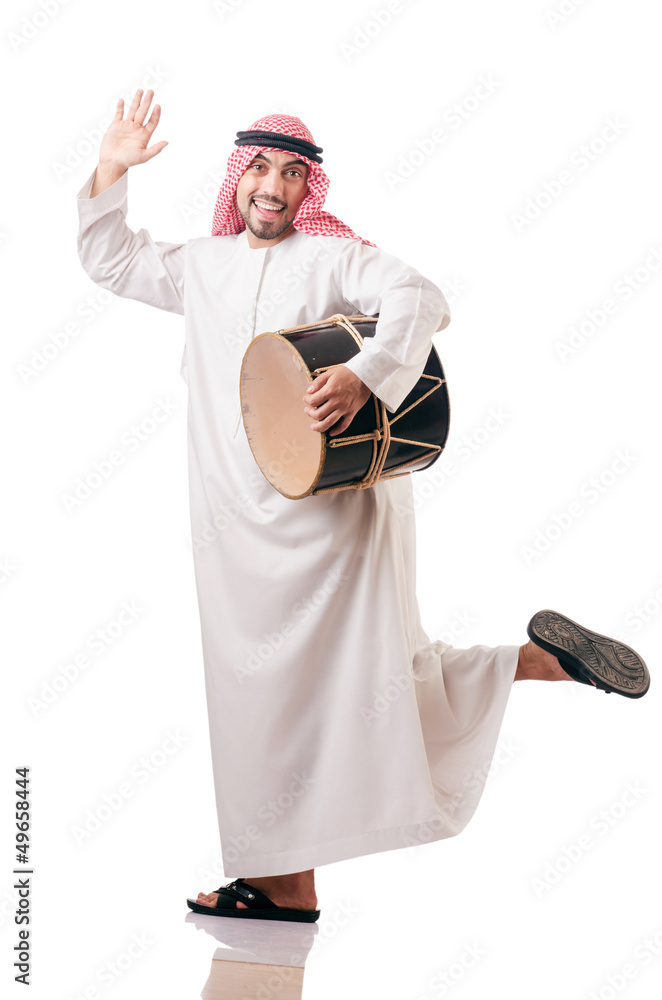 Arab man playing drum isolated on white Arab man playing drum isolated on white