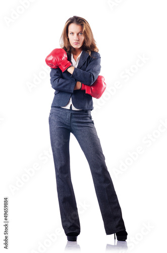 Woman businesswoman with boxing gloves on white © Elnur