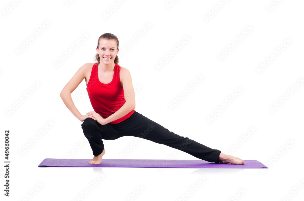 Young female doing exercises on white Young female doing exercises on white