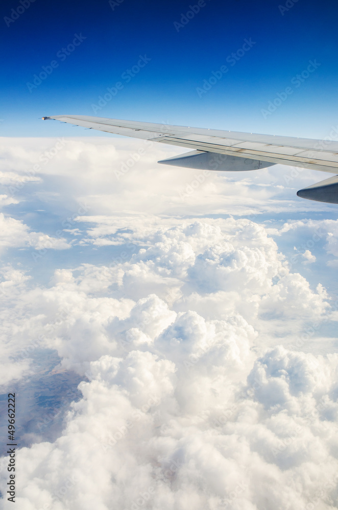 Airplane wing out of window Airplane wing out of window