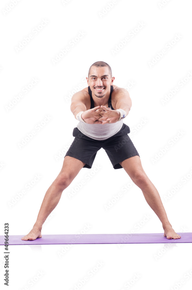 Man doing exercises on white