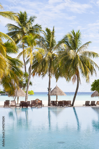 lagoon with sunshades and sunbeds