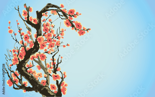 Vector background with flowering branches against a blue sky