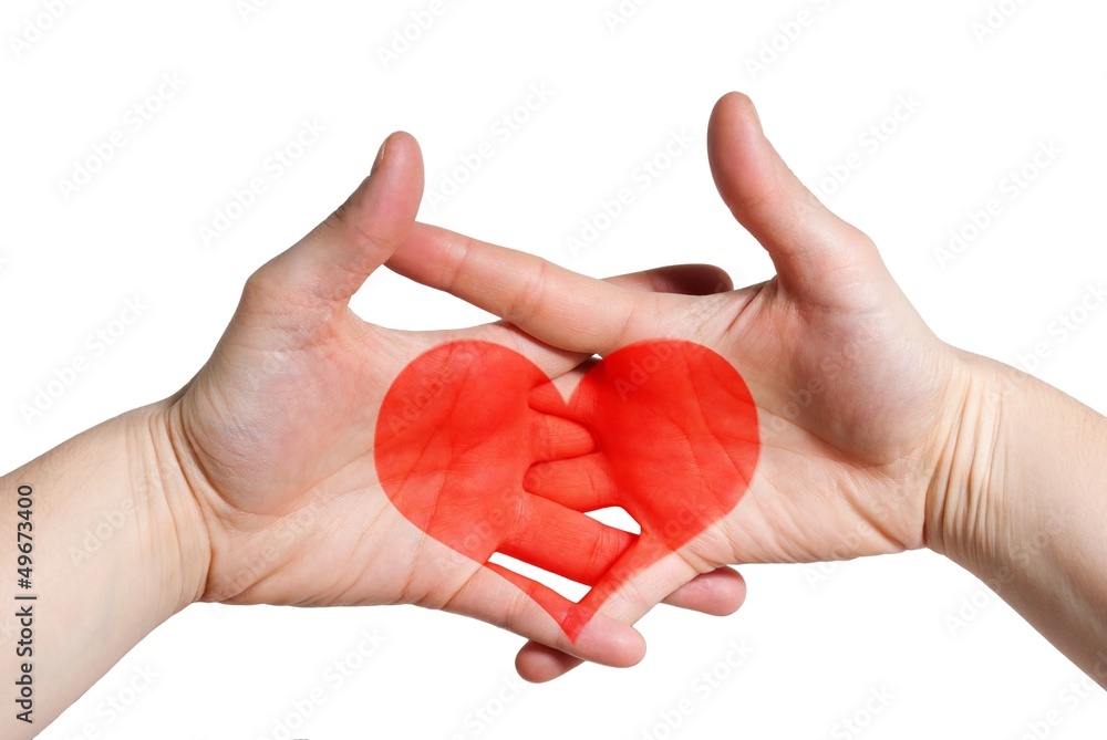 Obraz premium two hands with a heart