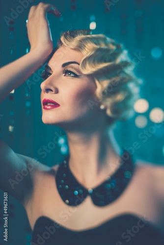 Elegant blond retro woman with beautiful hairdo