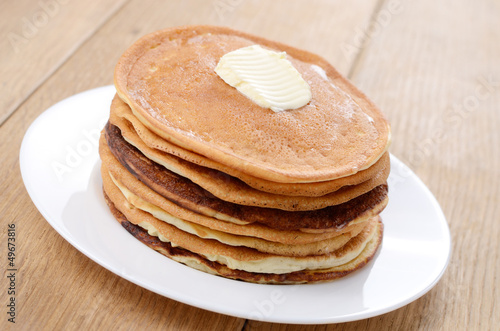 White plate with pancakes stack