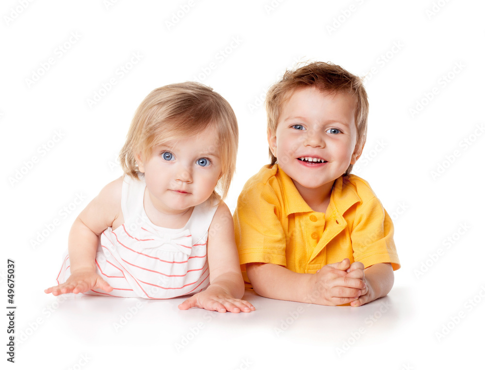 Smiling young brother and sister Isolated on a white background. Smiling young brother and sister Isolated on a white background.