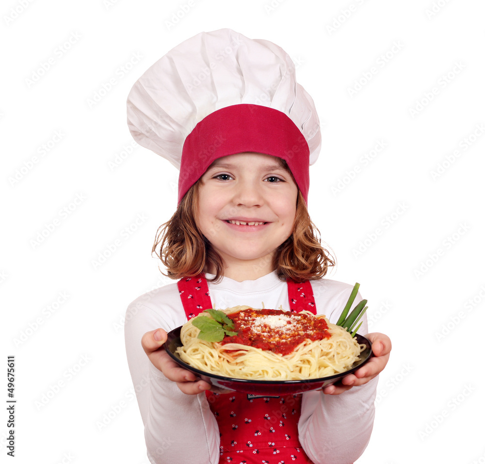 happy little girl cook holding dish with spaghetti happy little girl cook holding dish with spaghetti