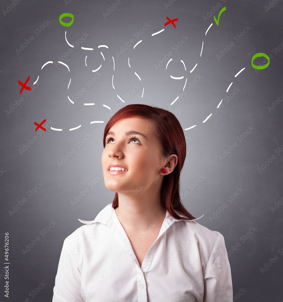 Young woman thinking with abstract marks overhead Young woman thinking with abstract marks overhead