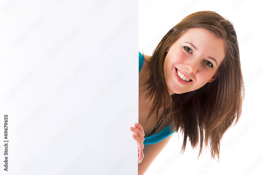 Beautiful brunette holding empty white board with copy space Beautiful brunette holding empty white board with copy space
