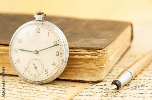 Antique book and clock