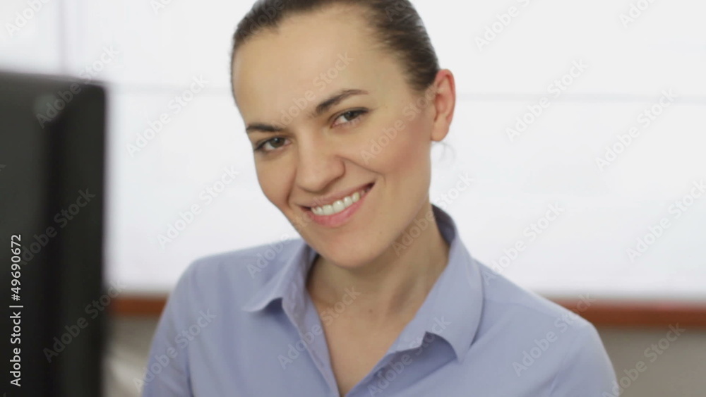 Happy business woman smiling to camera, close up Happy business woman smiling to camera, close up