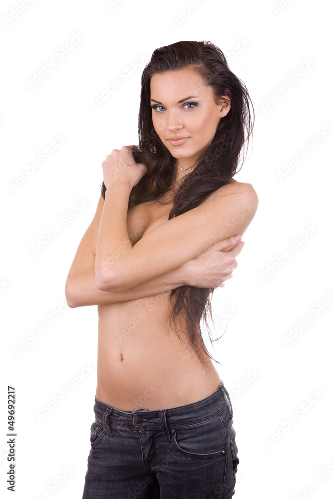Portrait of a beautiful nude young woman wearing jeans, isolated Stock  Photo | Adobe Stock