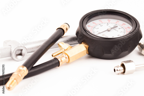 pressure gauge and tools isolated on white