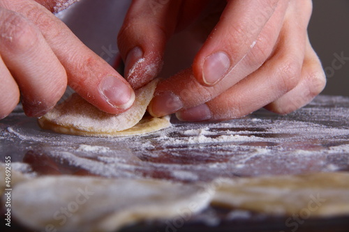 making of ravioli manti