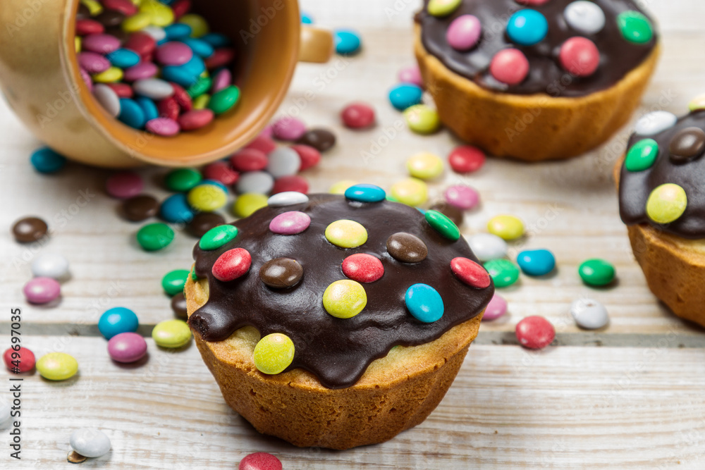 Decorating easter muffins with chocolate glaze Decorating easter muffins with chocolate glaze