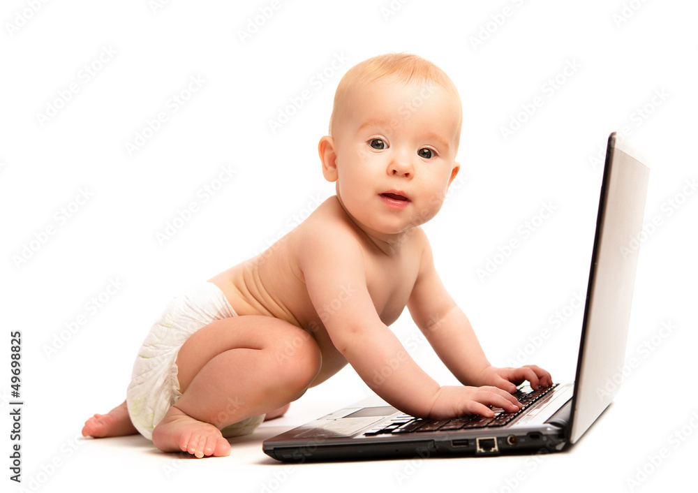 baby and a laptop computer isolated baby and a laptop computer isolated