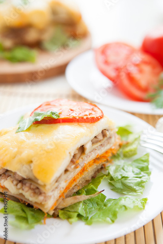Traditional lasagna with vegetables and parmesan