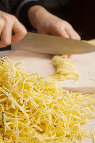 Noodles preparation from dough in home cuisine