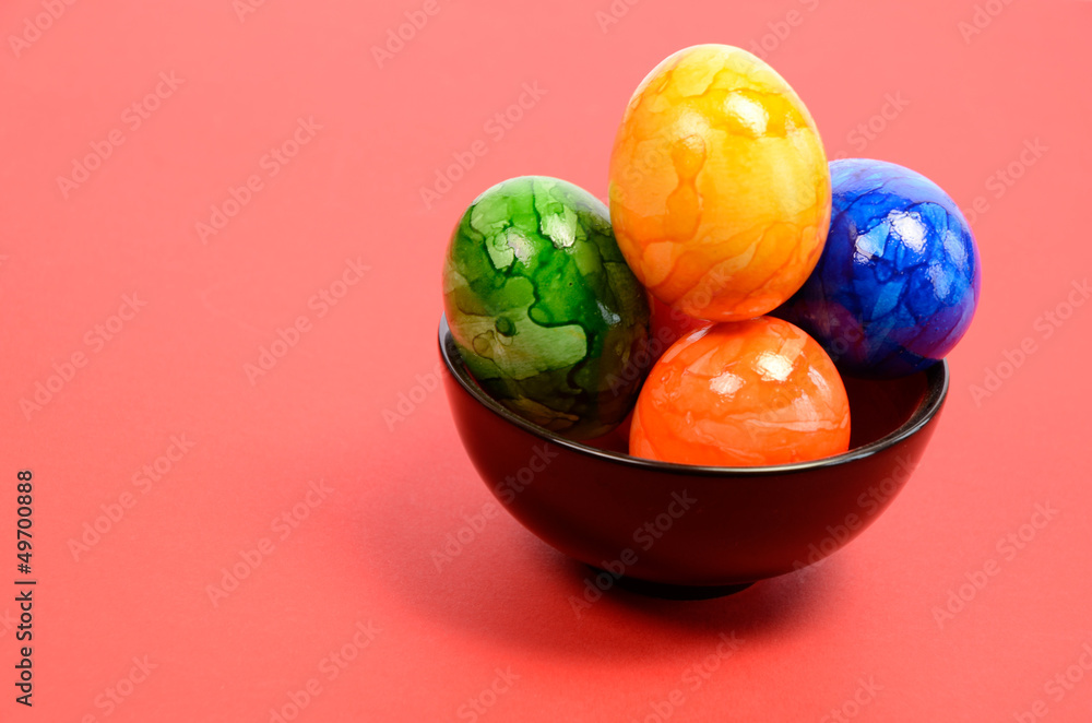 Colorful Easter eggs in a bowl