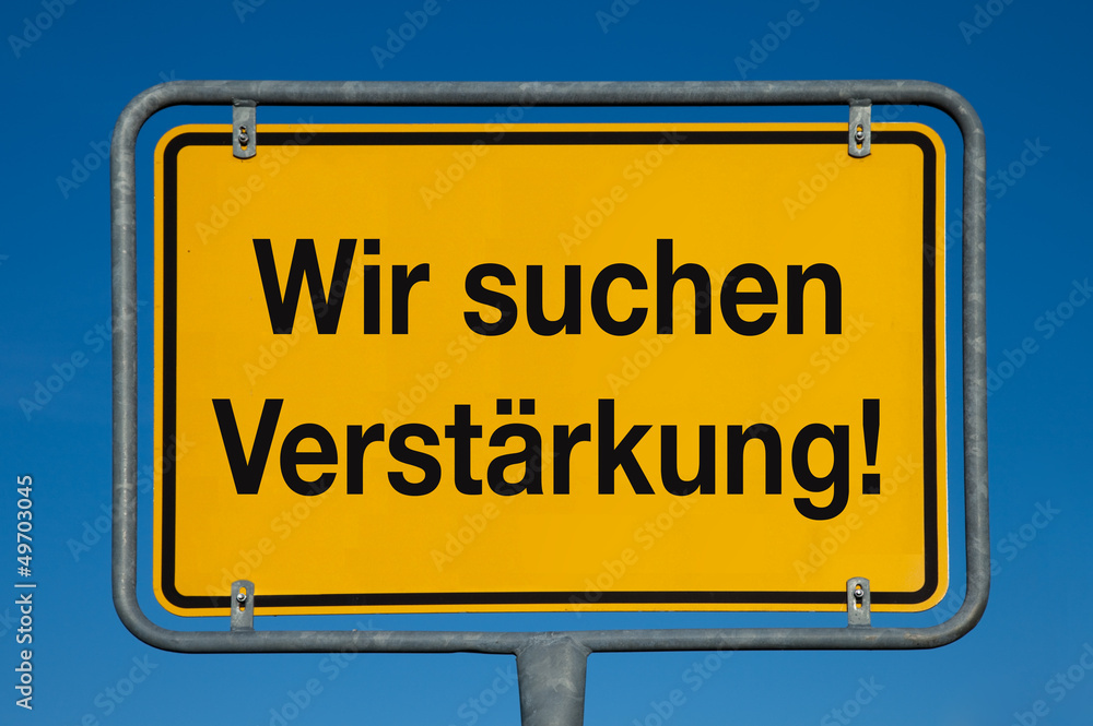 Ortsschild mit blauem Himmel WIR SUCHEN VERSTÄRKUNG! Ortsschild mit blauem Himmel WIR SUCHEN VERSTÄRKUNG!