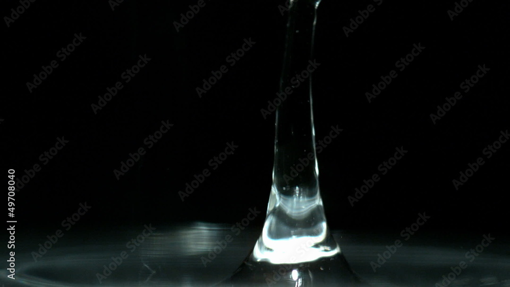 Water drop on a black background Water drop on a black background