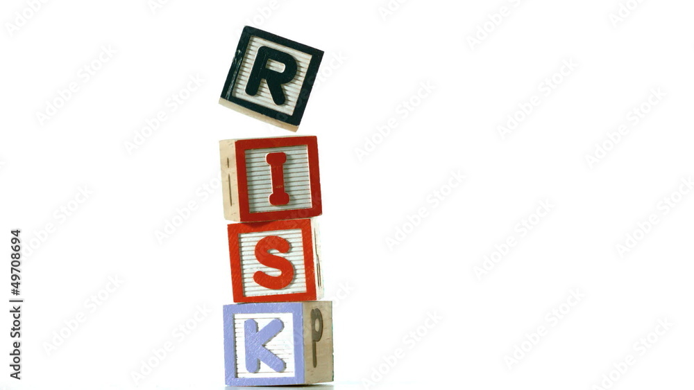 Blocks spelling Risk dropping down Blocks spelling Risk dropping down