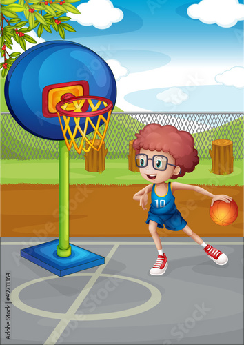 A boy playing basketball