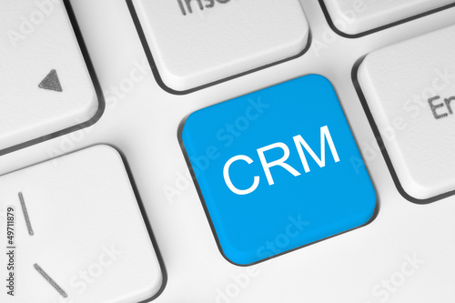 Blue CRM keyboard button .