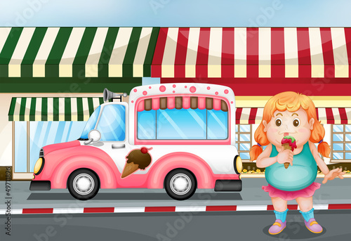 A fat young girl eating icecream